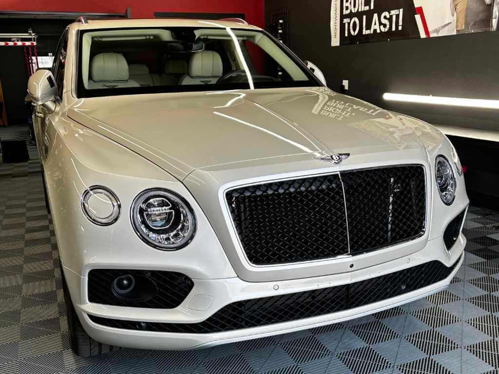 a white car in a showroom